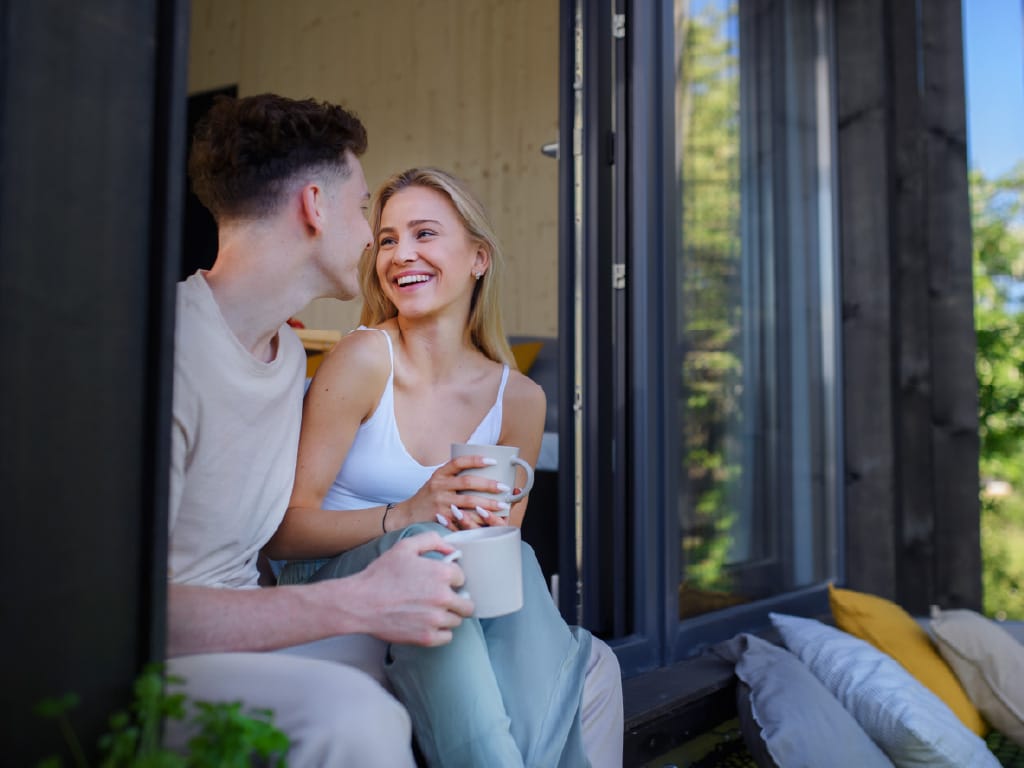Young couple in their tiny home investment property